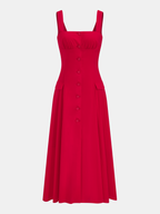Bright red sleeveless cotton-blend maxi dress with square neck, flared skirt, and front pockets.