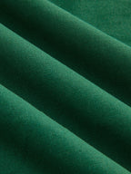 Teal green linen-blend mini dress with ruching, textured fabric, and four diagonal folds.