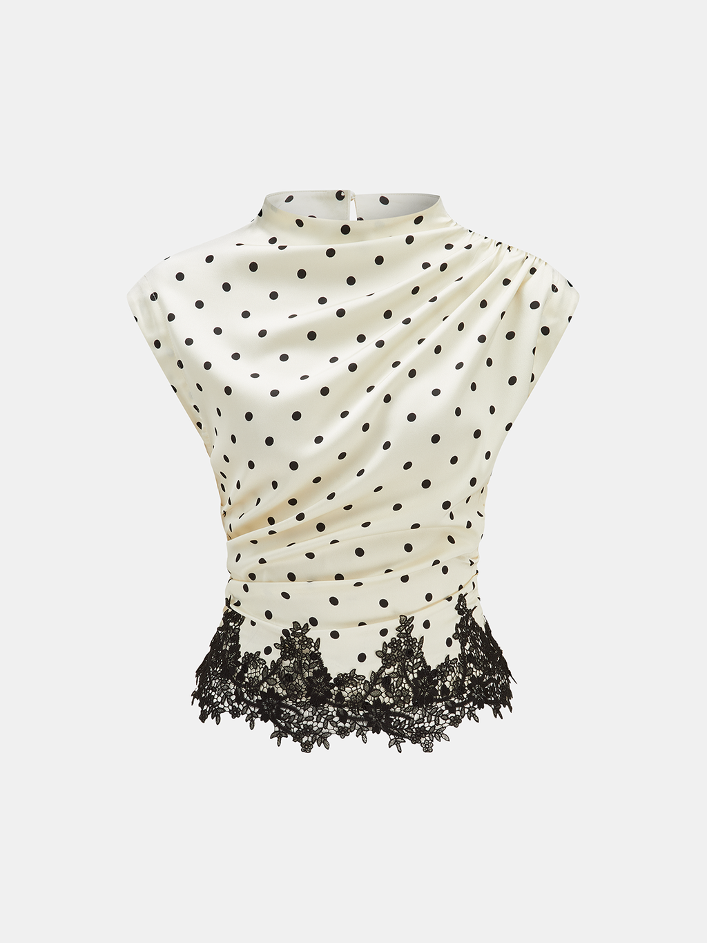 A sleeveless top with black polka dots, lace hem, and gentle ruching at the waist.