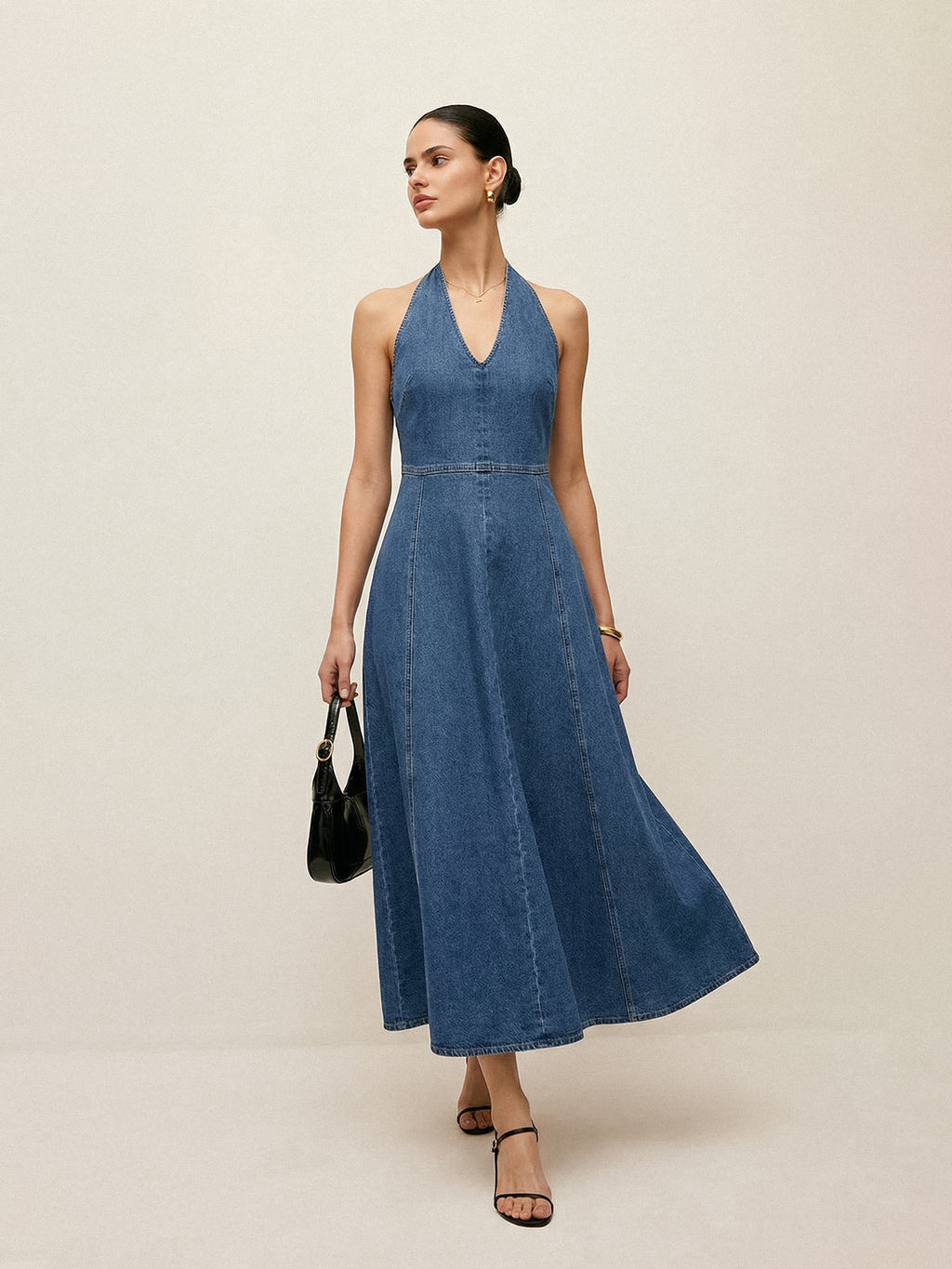 Sleeveless denim midi dress with a halter neckline from LA FINE FLEUR.