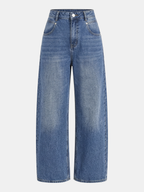 Soft denim mid-rise wide-leg jeans with Tencel-cotton blend, front closure, faded details.