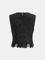 Sleeveless crop top with delicate floral lace, slim fit, and back zipper closure.
