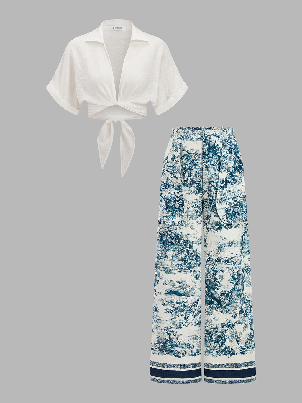 Knotted crop top and matching patterned pants set in blue and white toile print.