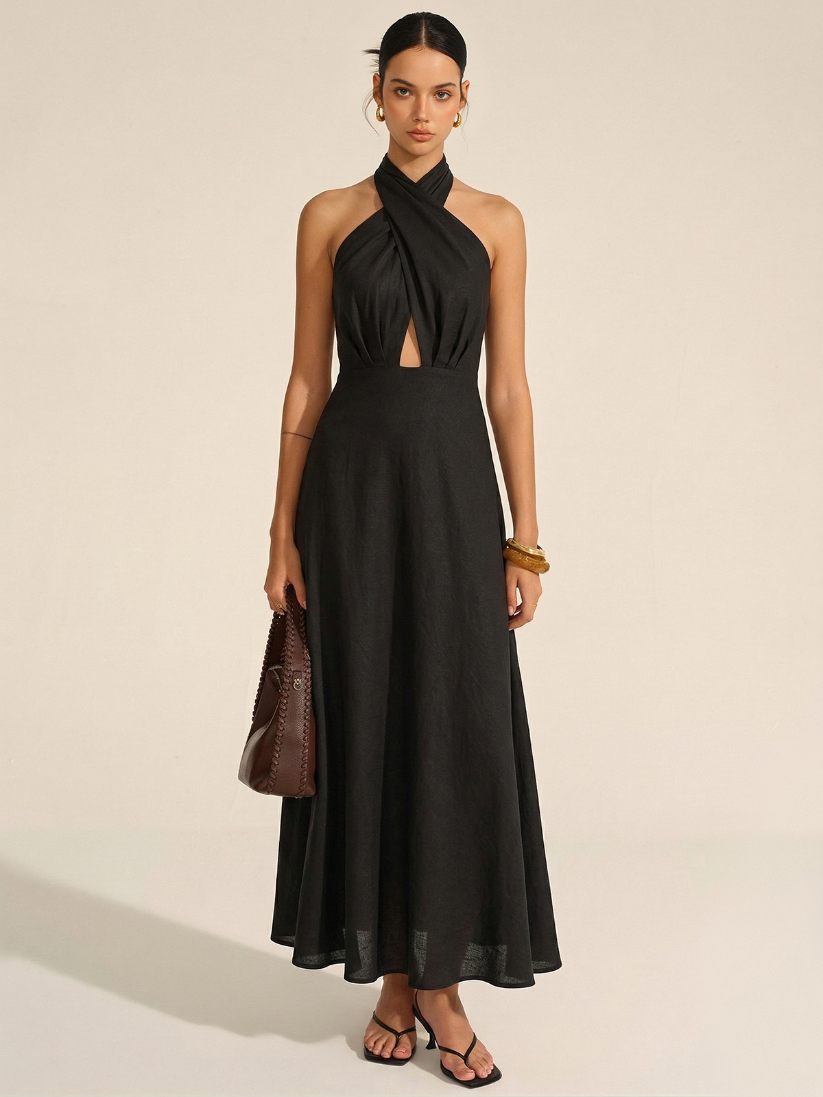 LA FINE FLEUR Cotton Linen Maxi Dress featuring a halter neck and cut-out detailing.