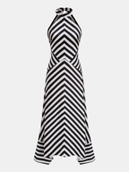 Halter neck striped maxi dress with black and white chevron pattern, fitted bodice, flared skirt.