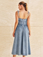 Denim midi dress with tie straps and a tiered silhouette by LA FINE FLEUR.