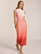 A ruched mesh gradient midi dress with an ombre pink and red bodycon design.