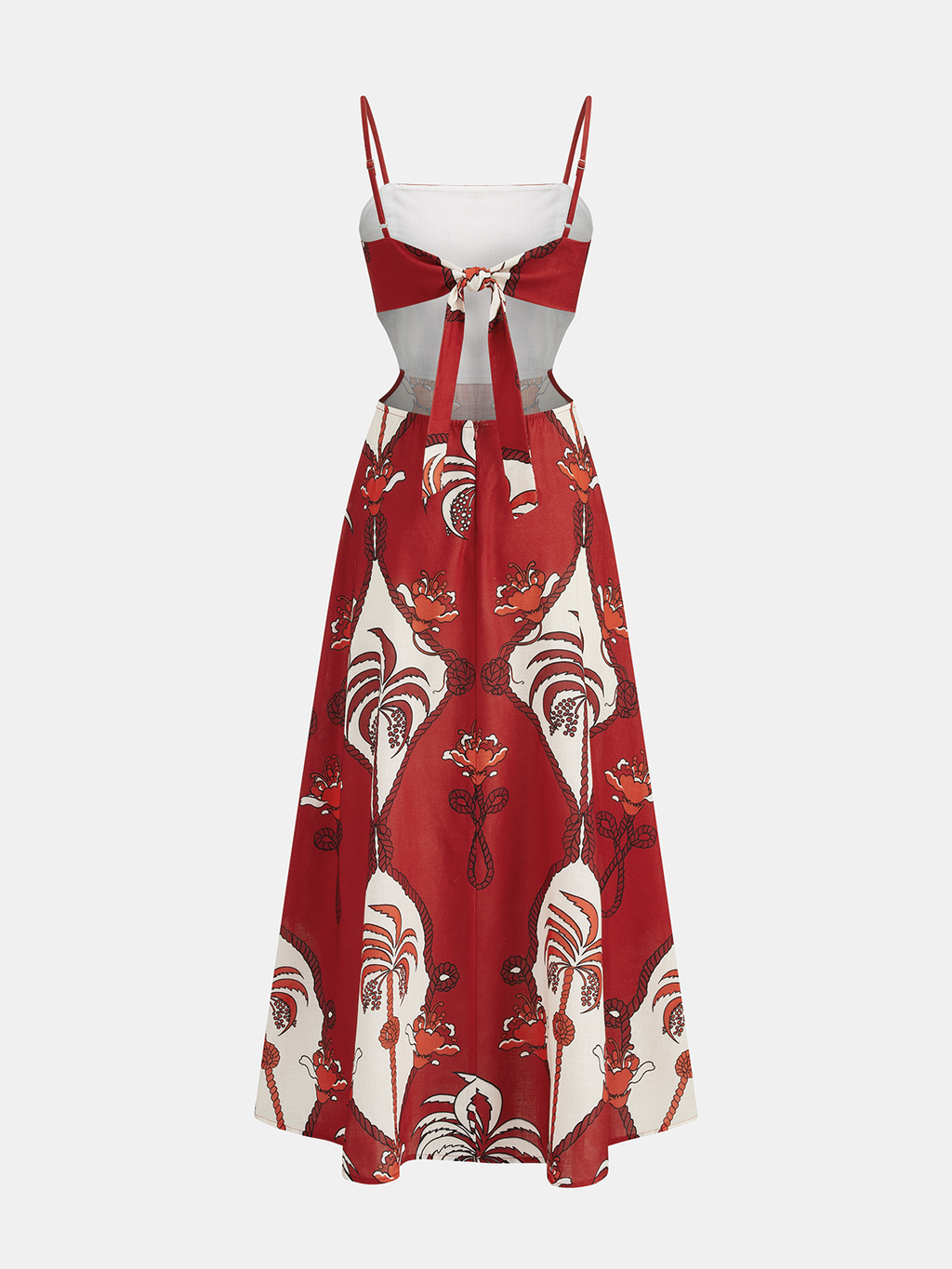 A lightweight cami dress with thin straps, front bow, cut-out waist, and floral print.