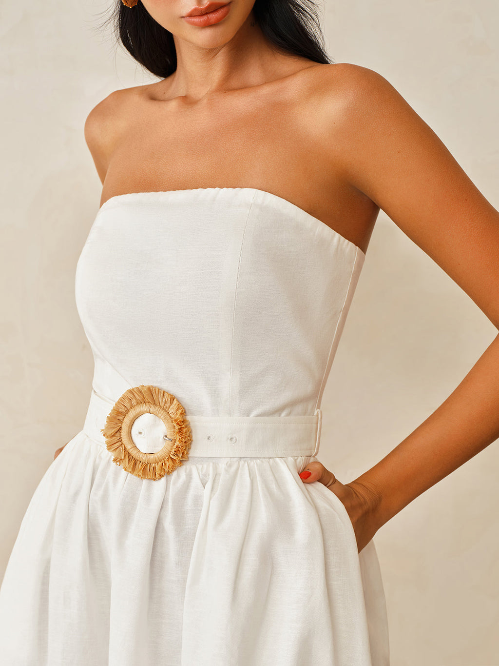 Strapless cotton linen maxi dress with gathered skirt and bold round woven beige buckle belt.