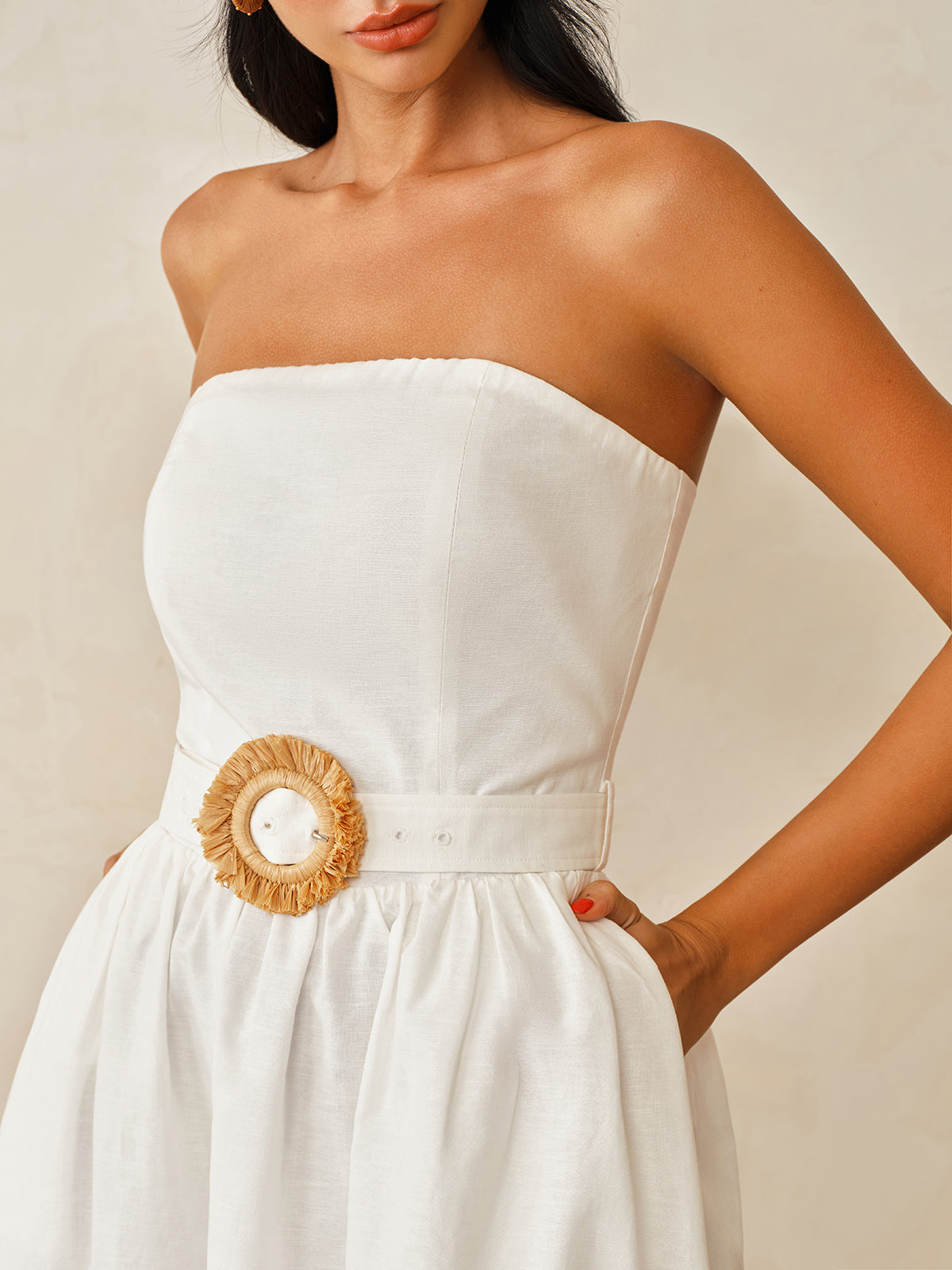 Strapless cotton linen maxi dress with gathered skirt and bold round woven beige buckle belt.