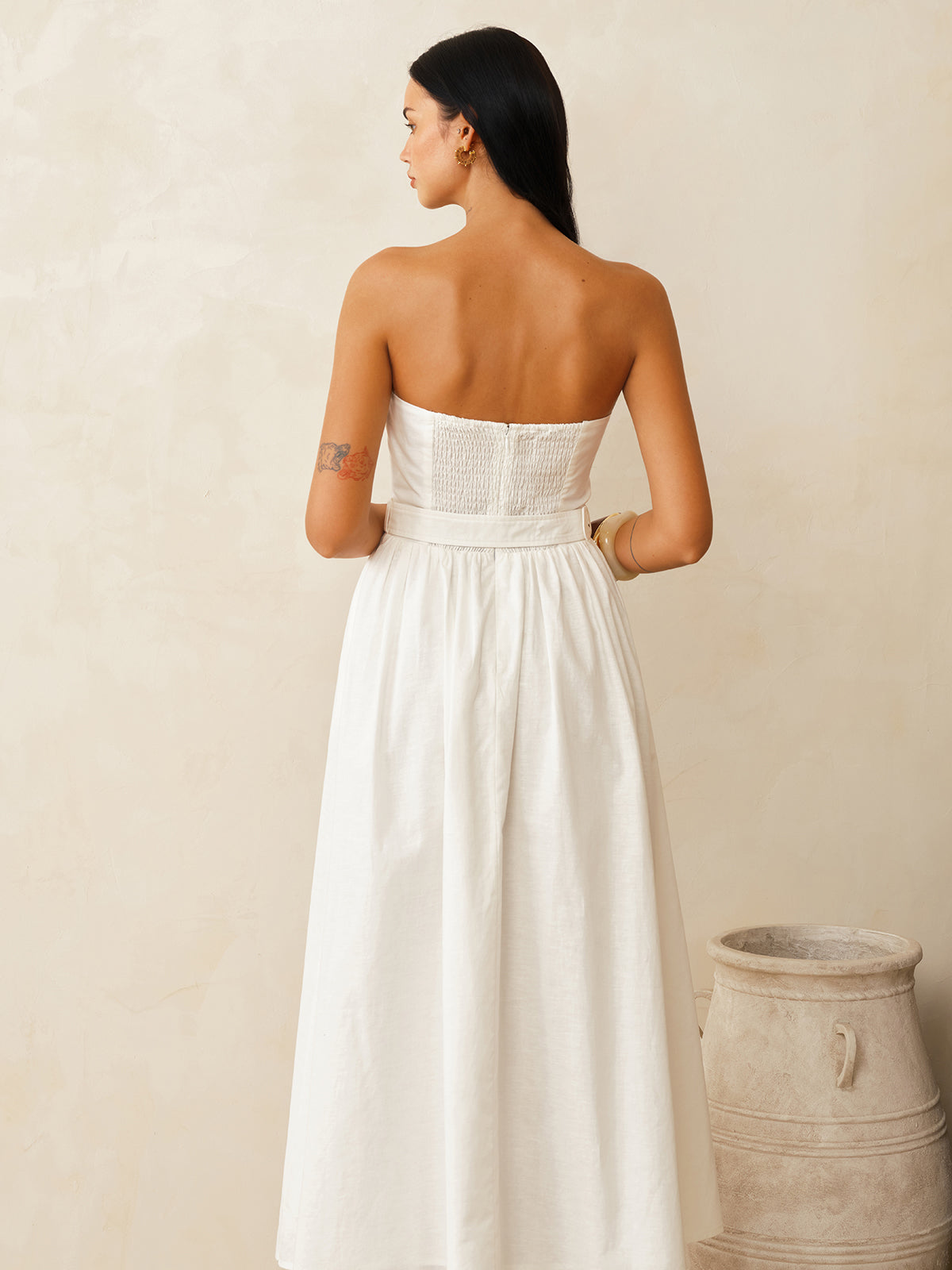 The LA FINE FLEUR Cotton Linen Strapless Maxi Dress with Belt in a flowing silhouette.