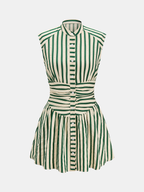 Sleeveless mini dress with green stripes, stand collar, button front, fitted waist, flared skirt.