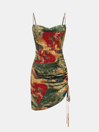 A mini dress with slim fit, spaghetti straps, marbled print, side ruching, asymmetrical hem.