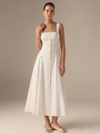 LA FINE FLEUR Cotton Blend Maxi Dress featuring a button-front closure and simple elegance.