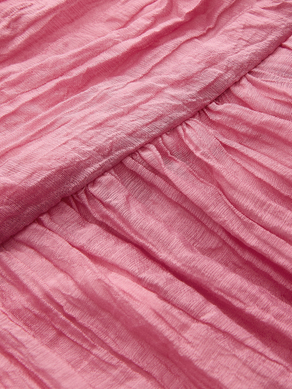 Crinkled textured fabric and diagonal seam detail on LA FINE FLEUR's halter maxi dress.
