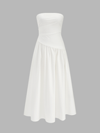 Strapless ruched maxi dress with a flowy silhouette, perfect for formal occasions.