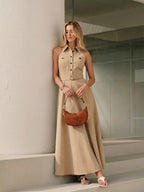 The LA FINE FLEUR Collared Halter Maxi Dress with Backless Belt Design in a light fabric.