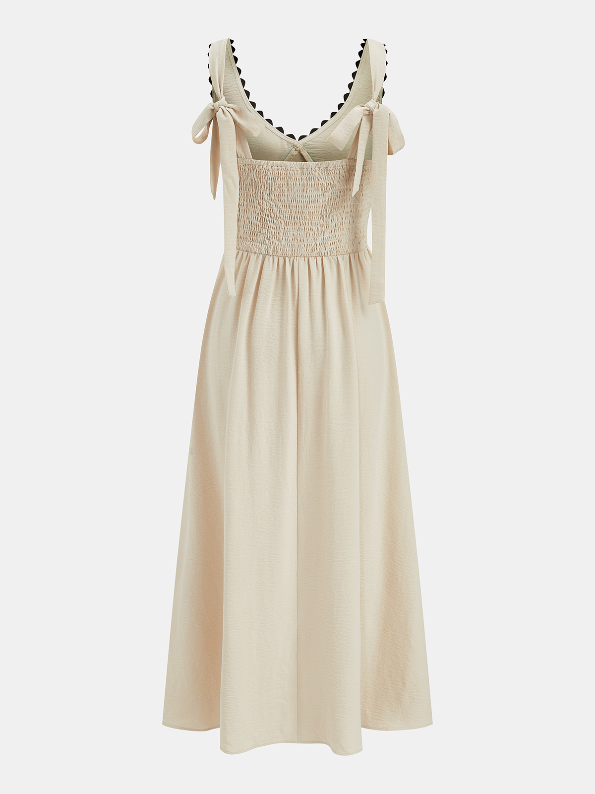 Sleeveless maxi dress with adjustable tie straps, smocked bodice, wavy trim, and flared skirt.