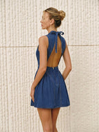 Sleeveless denim mini dress with open back from LA FINE FLEUR.