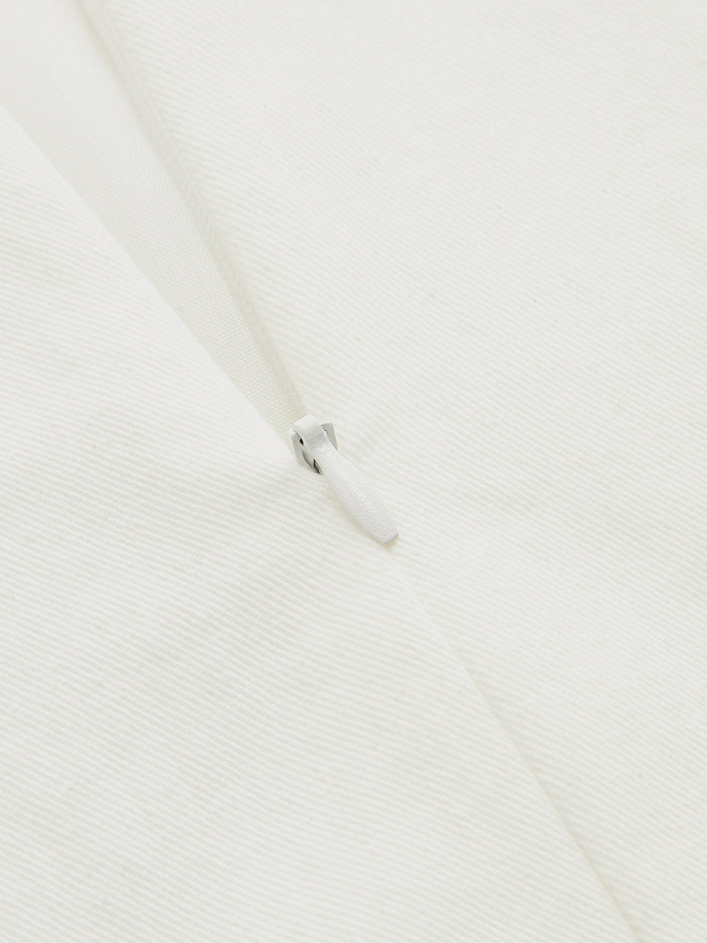 Close-up of LA FINE FLEUR Contrast Stitch Midi Dress with buttoned cami and white zipper.