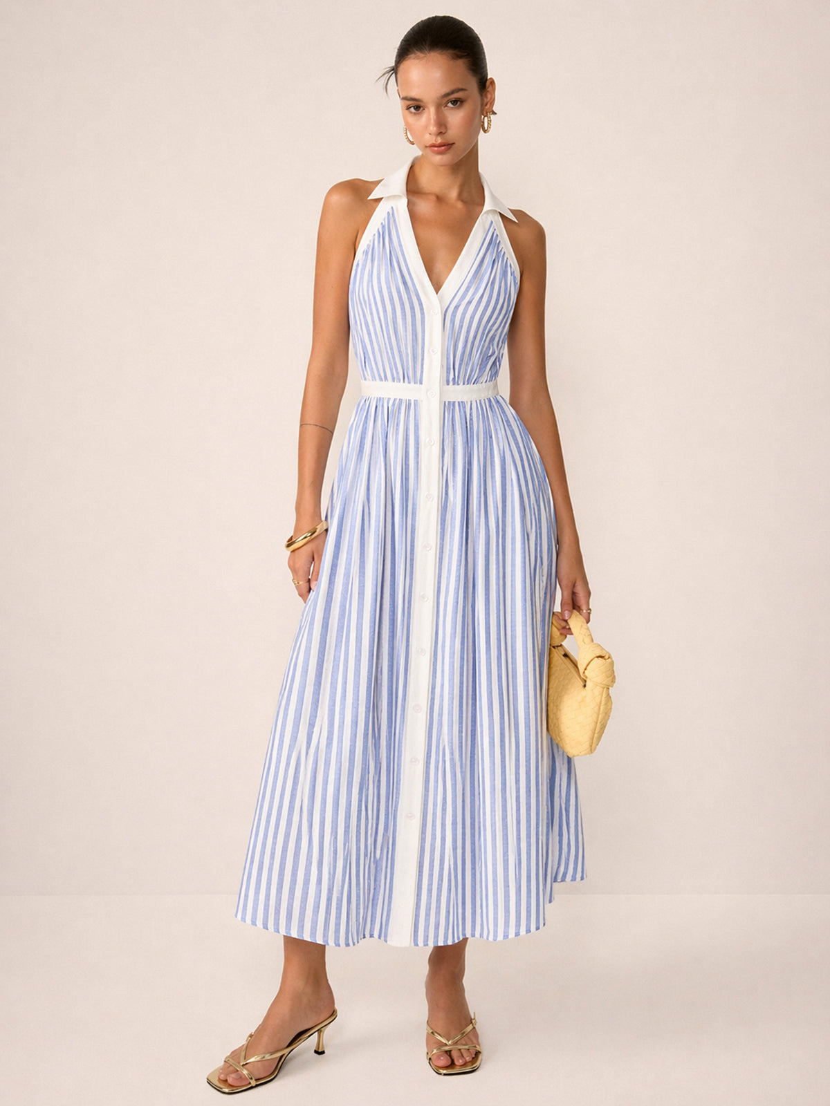 LA FINE FLEUR Striped Halter Midi Dress with blue and white stripes and button-down front.