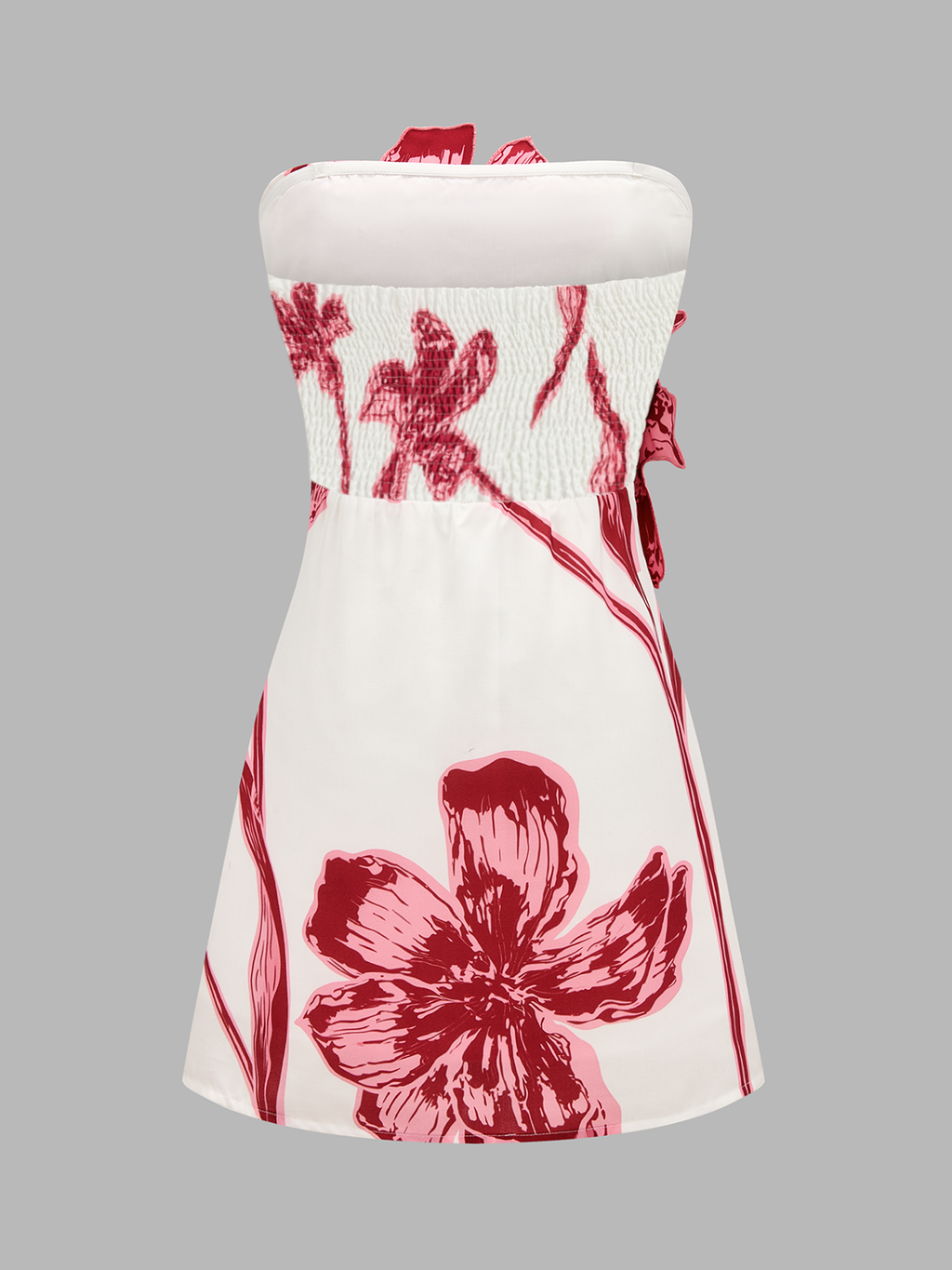 Strapless mini dress with a fitted bodice and flared skirt, featuring 3D floral details.