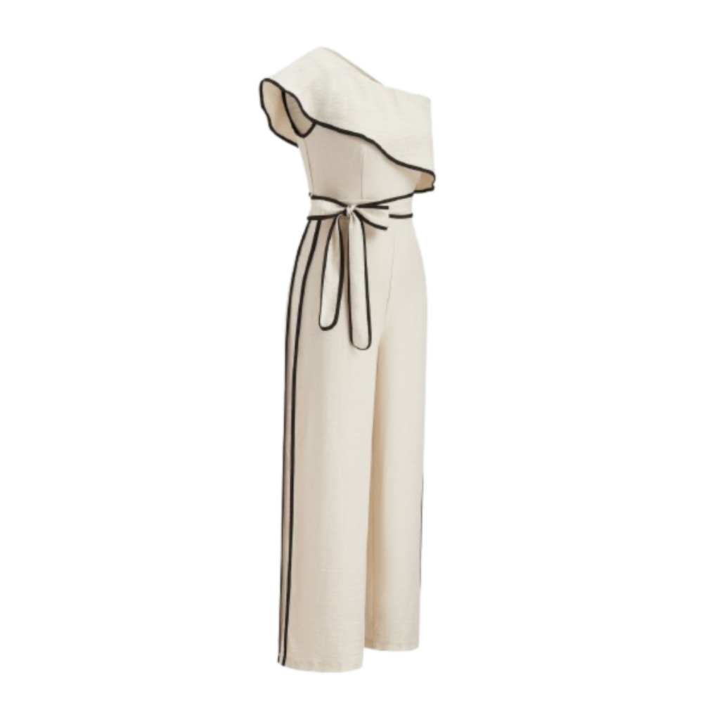 Cream one-shoulder jumpsuit with ruffles, black piping, wide legs, side stripes, and belt.