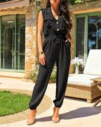Sleeveless notched collar jumpsuit with drawstring waist and flap pockets by LA FINE FLEUR .