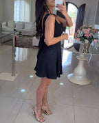 Square neck, thick strap textured romper with tie back skorts in a stylish design.