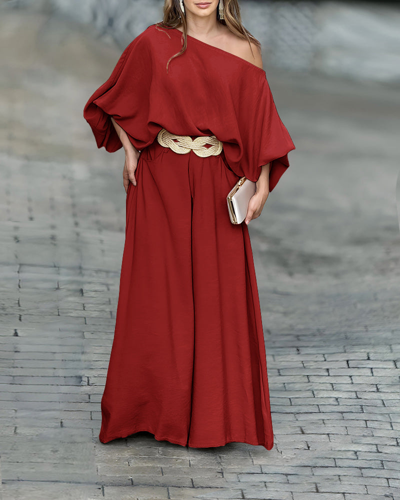 LA FINE FLEUR Skew Neck Lantern Sleeve Blouse and Wide Leg Pants Set with belt.