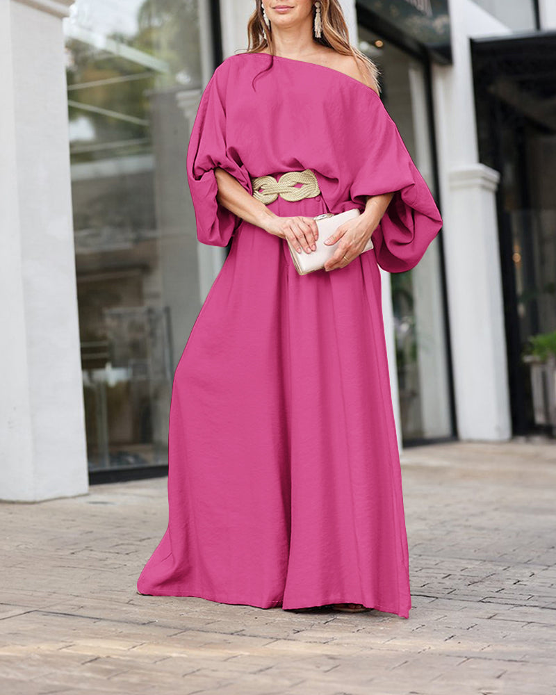 Magenta skew neck lantern sleeve blouse and wide leg pants set with elegant tailoring.