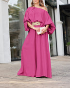 Magenta skew neck lantern sleeve blouse and wide leg pants set with elegant tailoring.