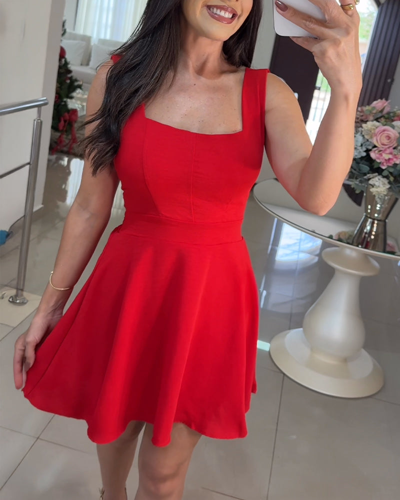 A square-neck, thick-strap textured romper with tie-back skorts in a chic design.
